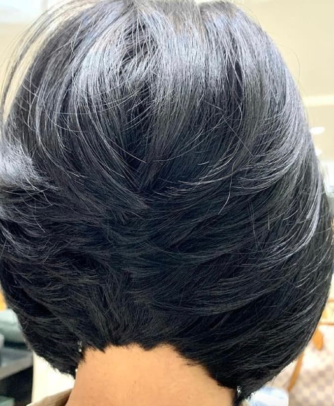 Short dark hairstyle with smooth layered volume